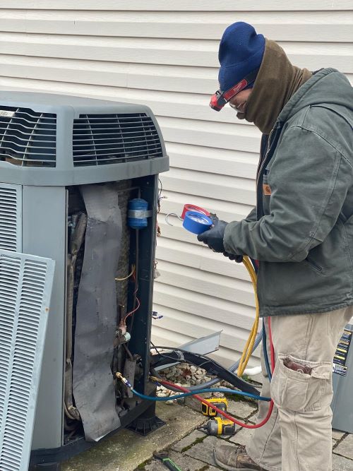 John Hartman (tech) Working On Customer System 500